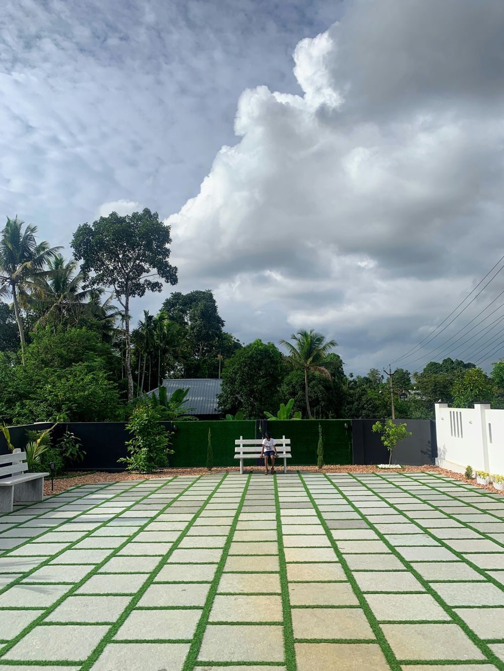 Grid paver patio with grass joints
